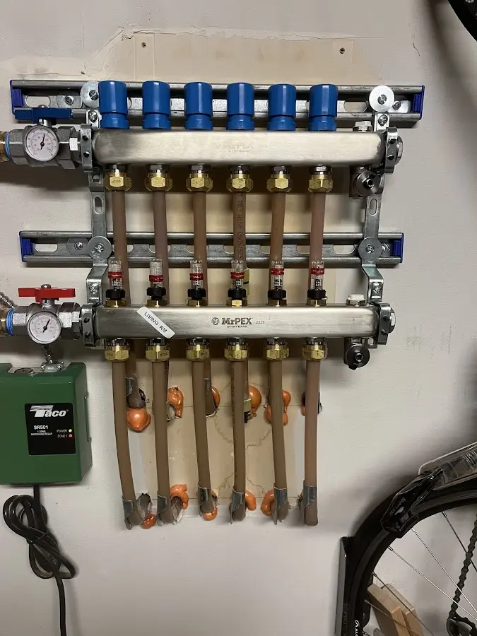 Plumber performing Water Heater Repair at a residential property in American Falls